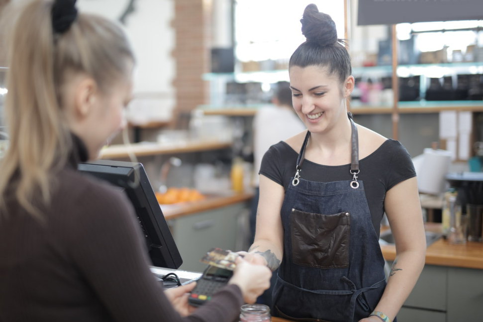 A person buying Bitcoins at a Counter